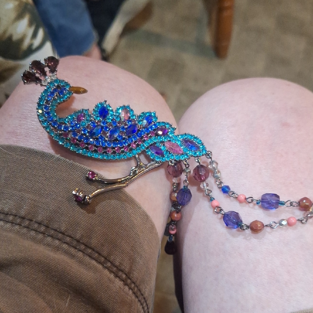 Elegant Peacock Brooch with Blue and Purple Crystals